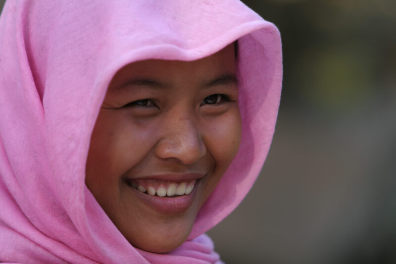 Learning to Read — Women in a Muslim village in Rural Cambodia gather to learn how to read, in a ADRA program that has come to their village — Cambodia, Wome...