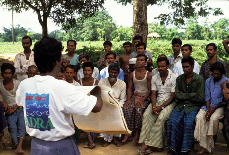 Agricultural Instruction in Bangladesh — Men in Bangladesh gather around for agricultural training, conducted by ADRA — Bangladesh, Adult Education, agricult...