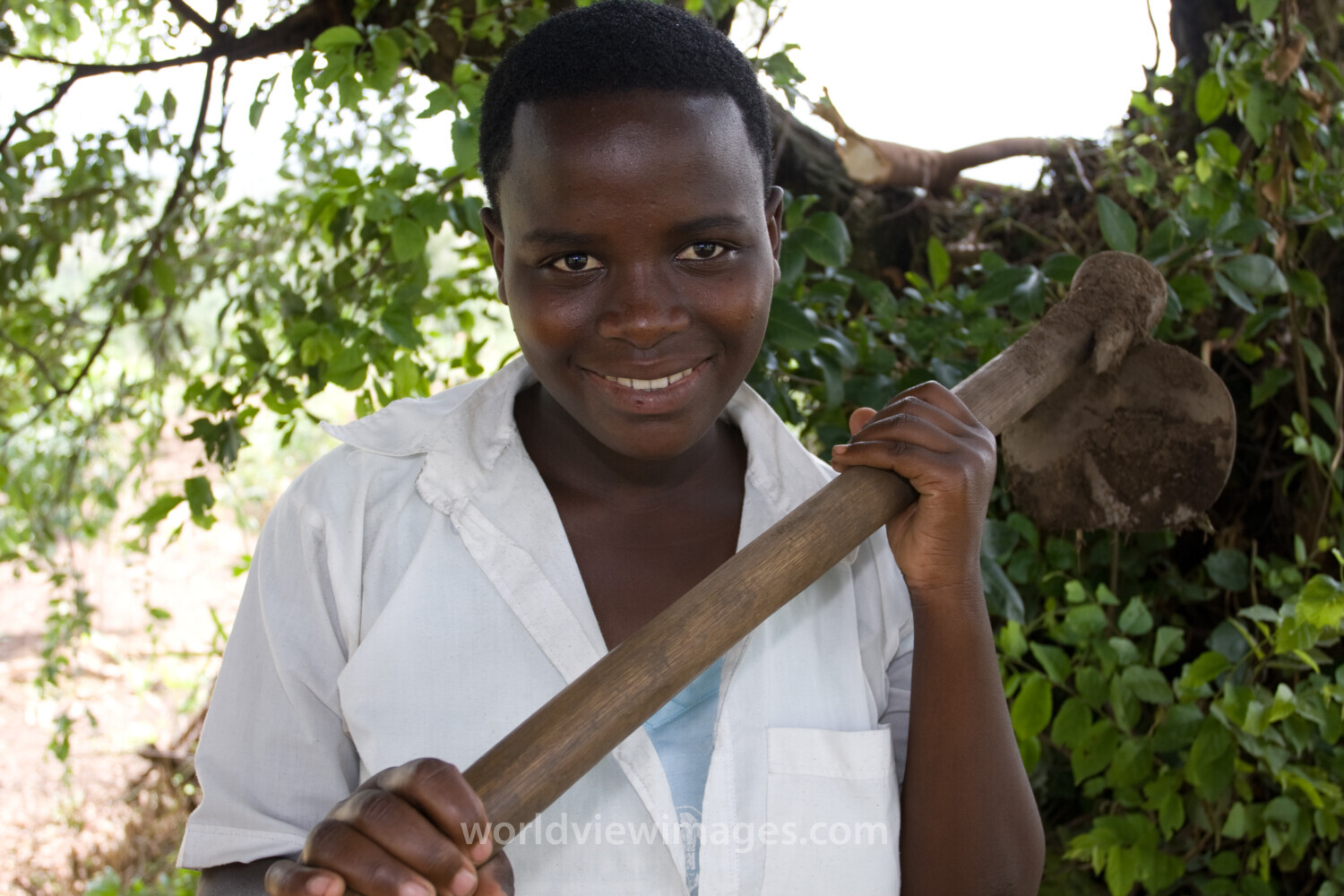 Girl with Hoe in Rwanda