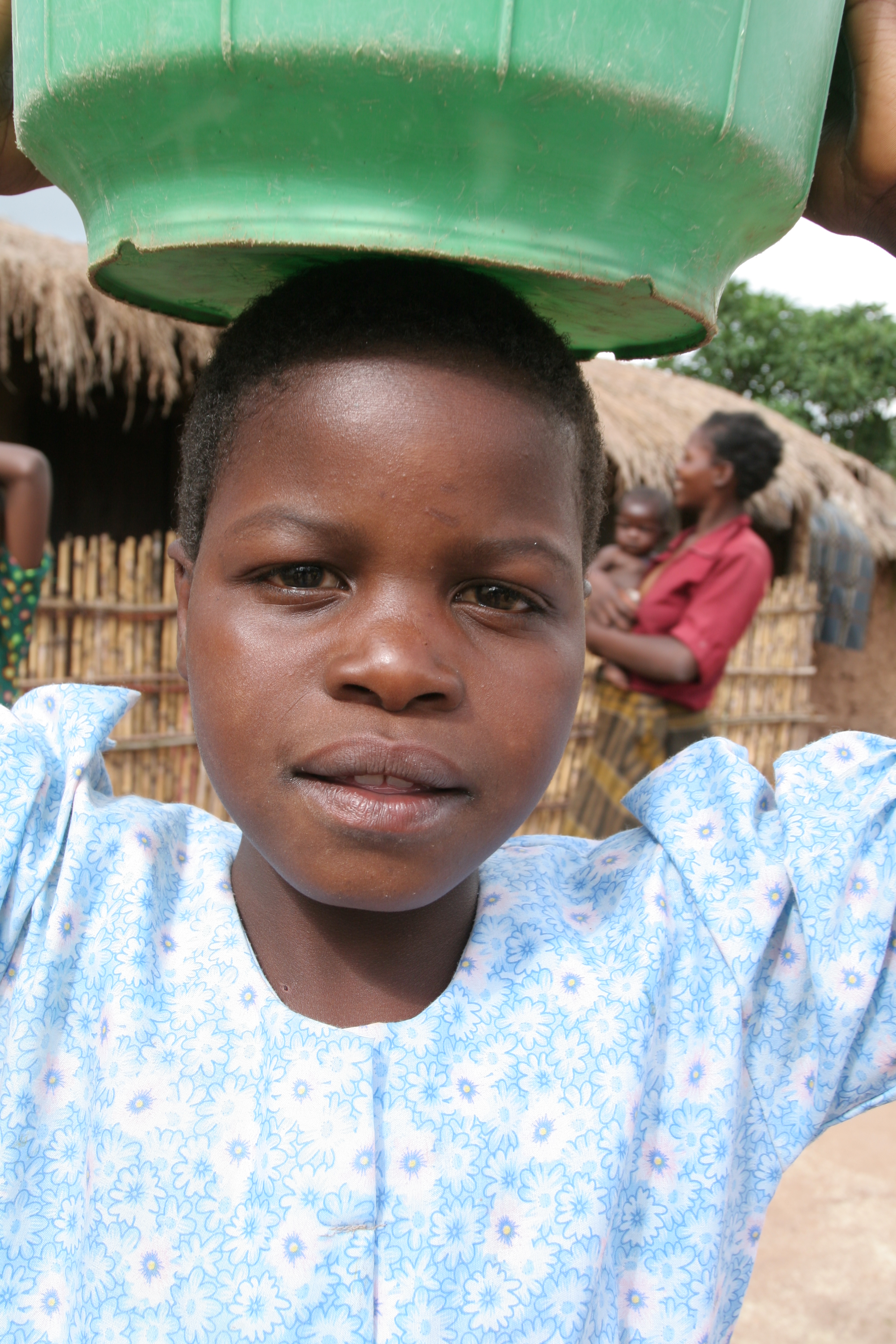 Girl with Bucket in Malawi
