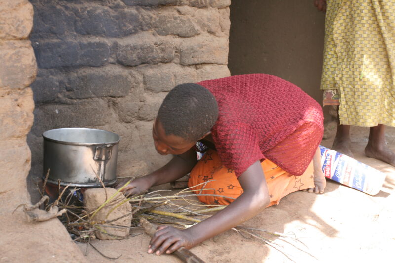 Girl Cooks Greens — Malawi, Africa, girl, girls, cooking