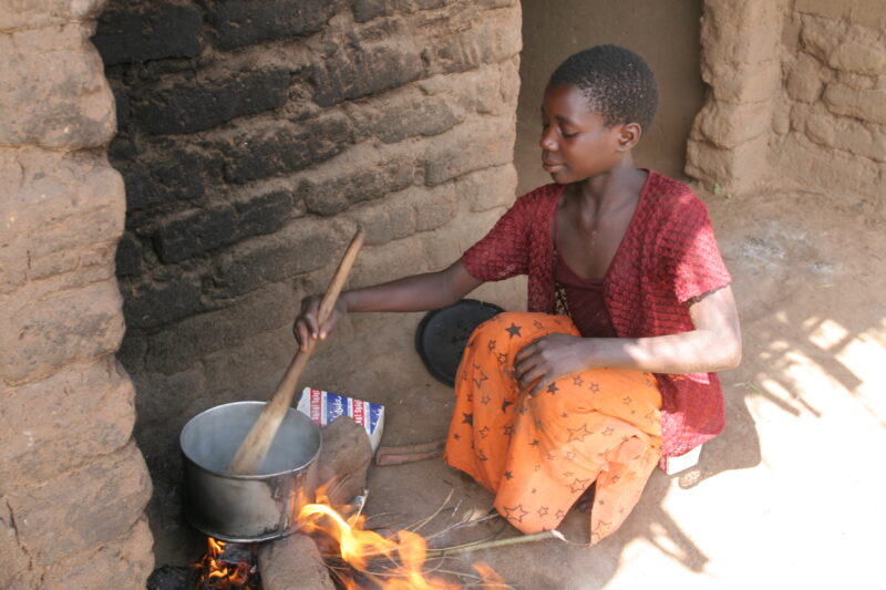 Girl Cooks Greens — Malawi, Africa, girl, girls, cooking