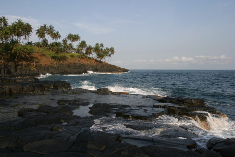 Volcanic Shoreline of Sao Tome — Stock Images of a lava rock beach on the island of Sao Tome, Africa — Sao Tome, Africa, ocean, scenic, lava