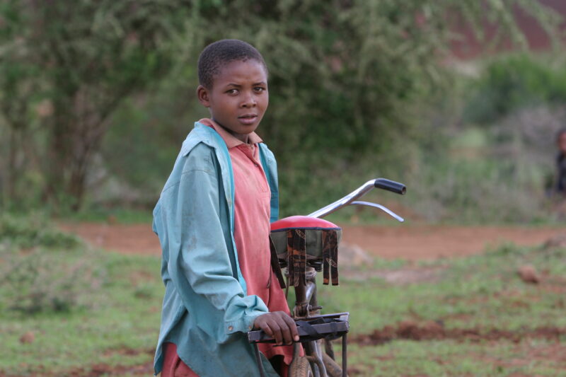 Girl and her Bicycle — Tanzania, Africa, Poverty, Development, Hanang