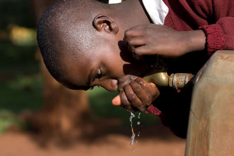 Getting a Drink — Students at an Elementary school in the Hanang district of Tanzania, Africa — ADRA, Africa, Development, Poverty, Tanzania