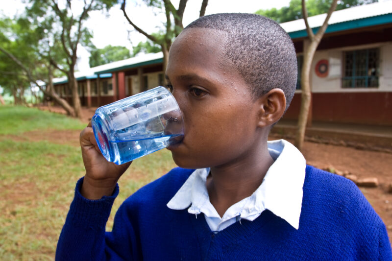 Getting a Drink — Students at an Elementary school in the Hanang district of Tanzania, Africa — ADRA, Africa, Development, Poverty, Tanzania