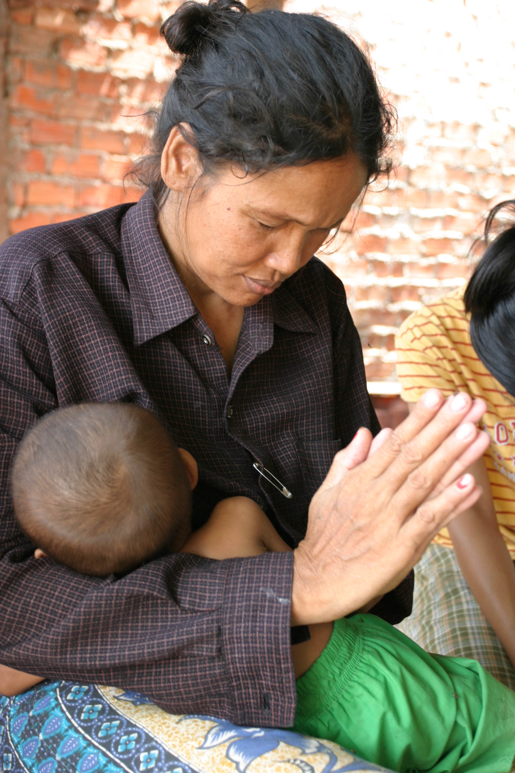 People Praying in Cambodia