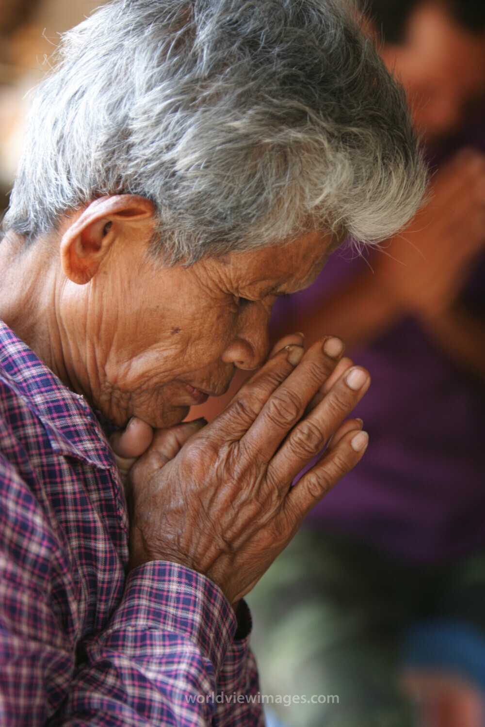 People Praying in Cambodia