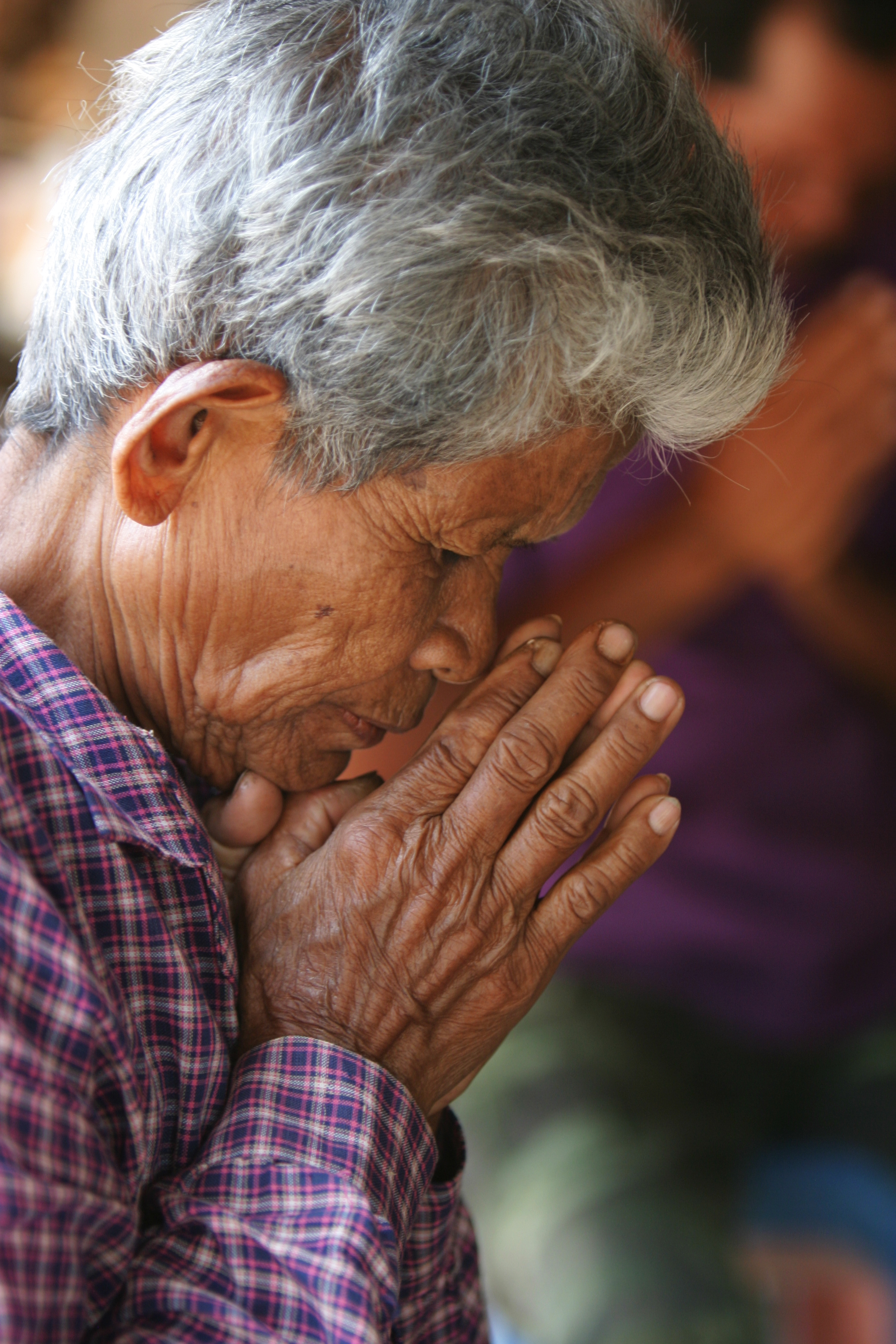 People Praying in Cambodia