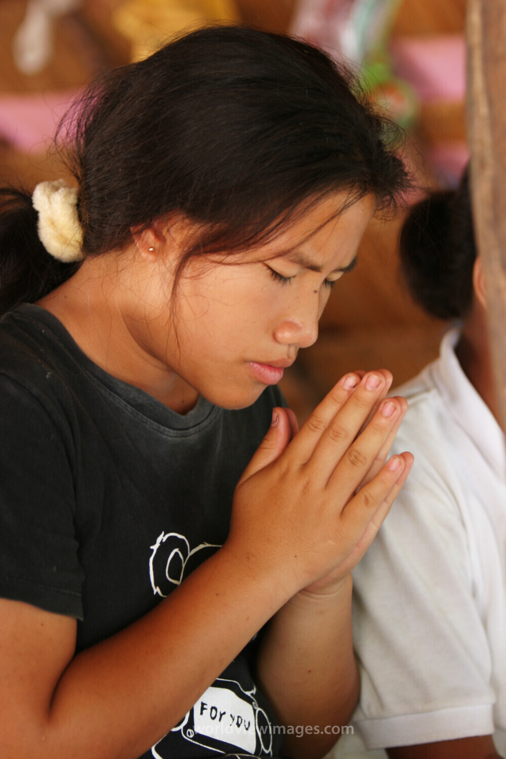 People Praying in Cambodia