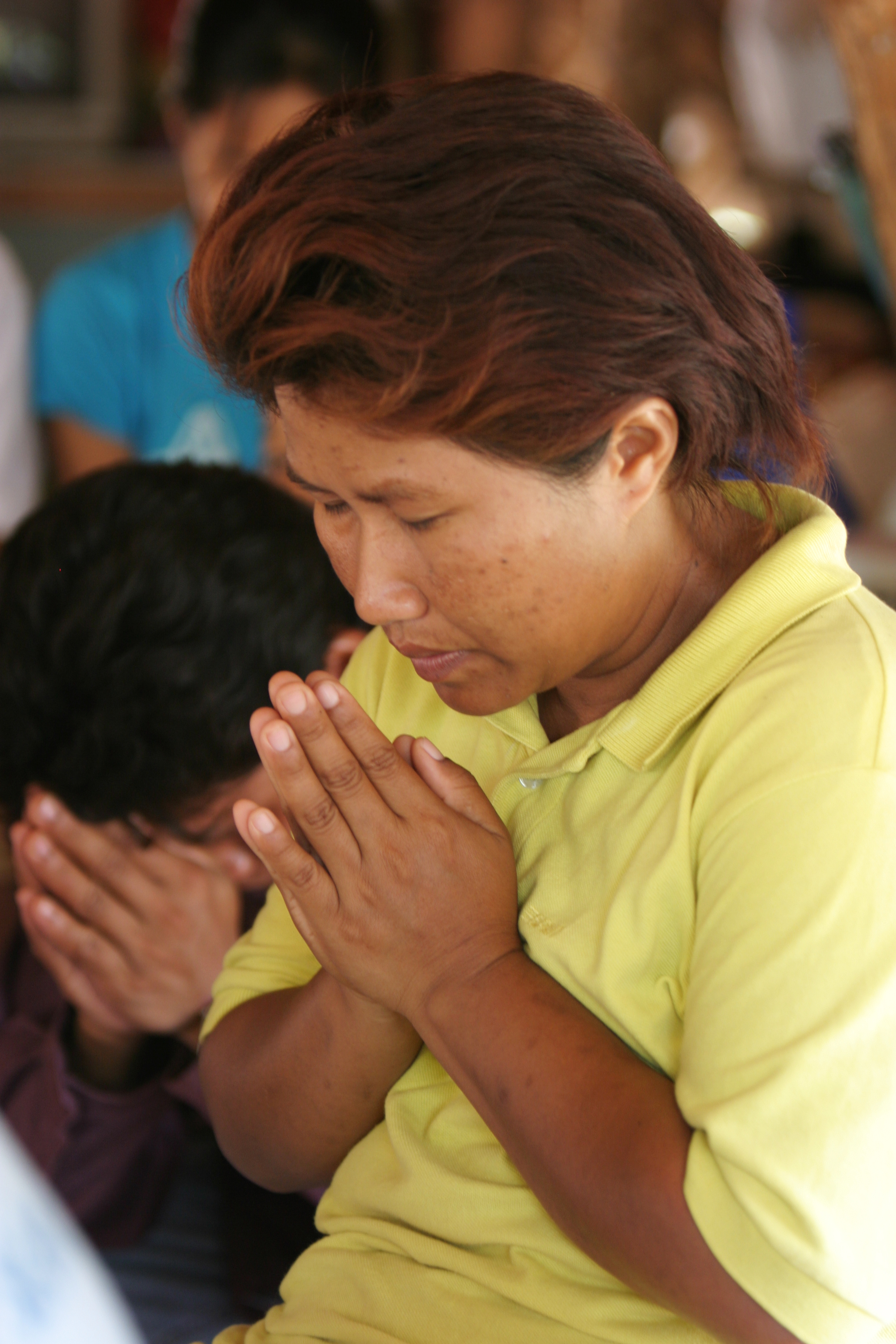 People Praying in Cambodia