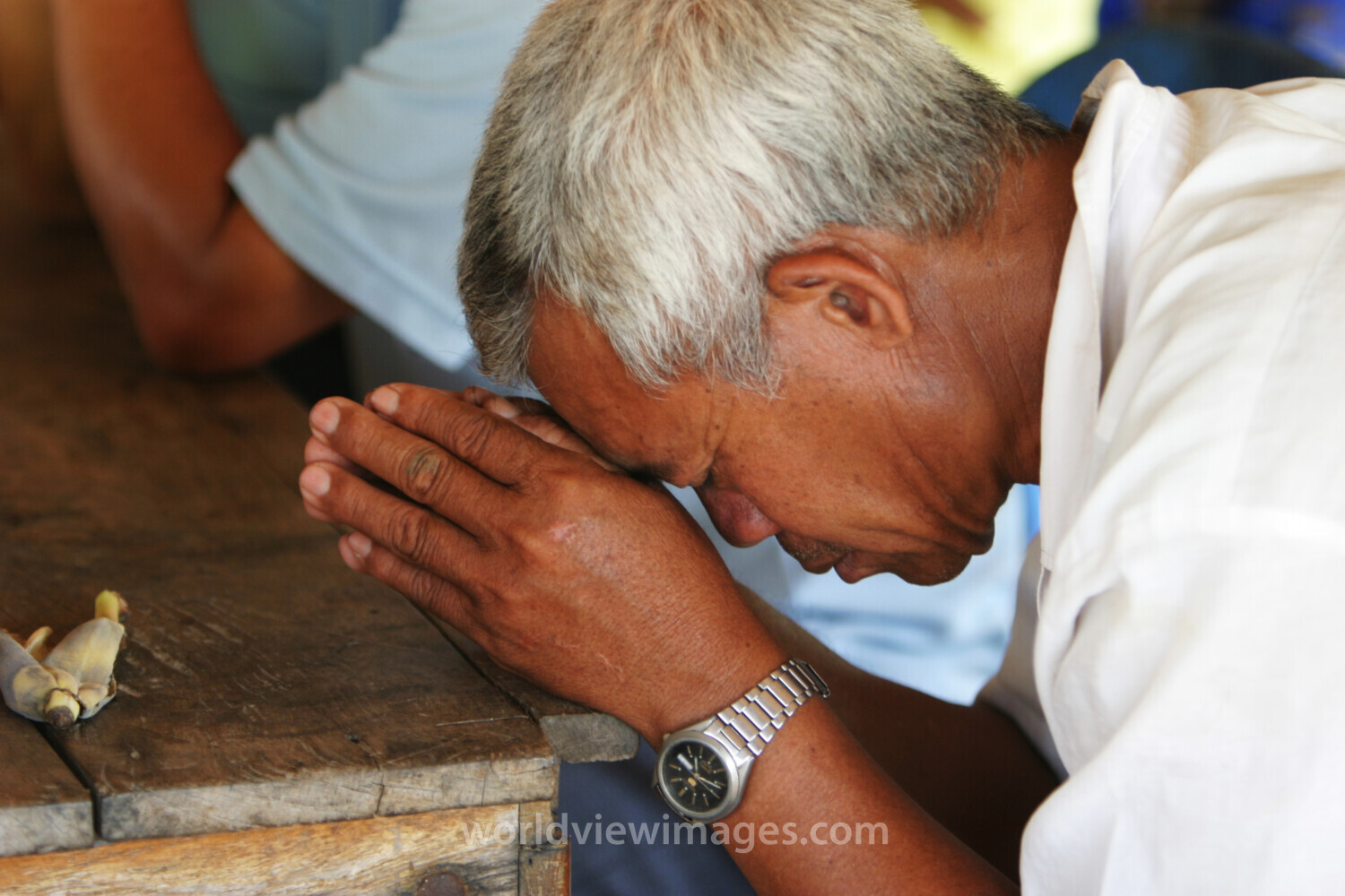 People Praying in Cambodia