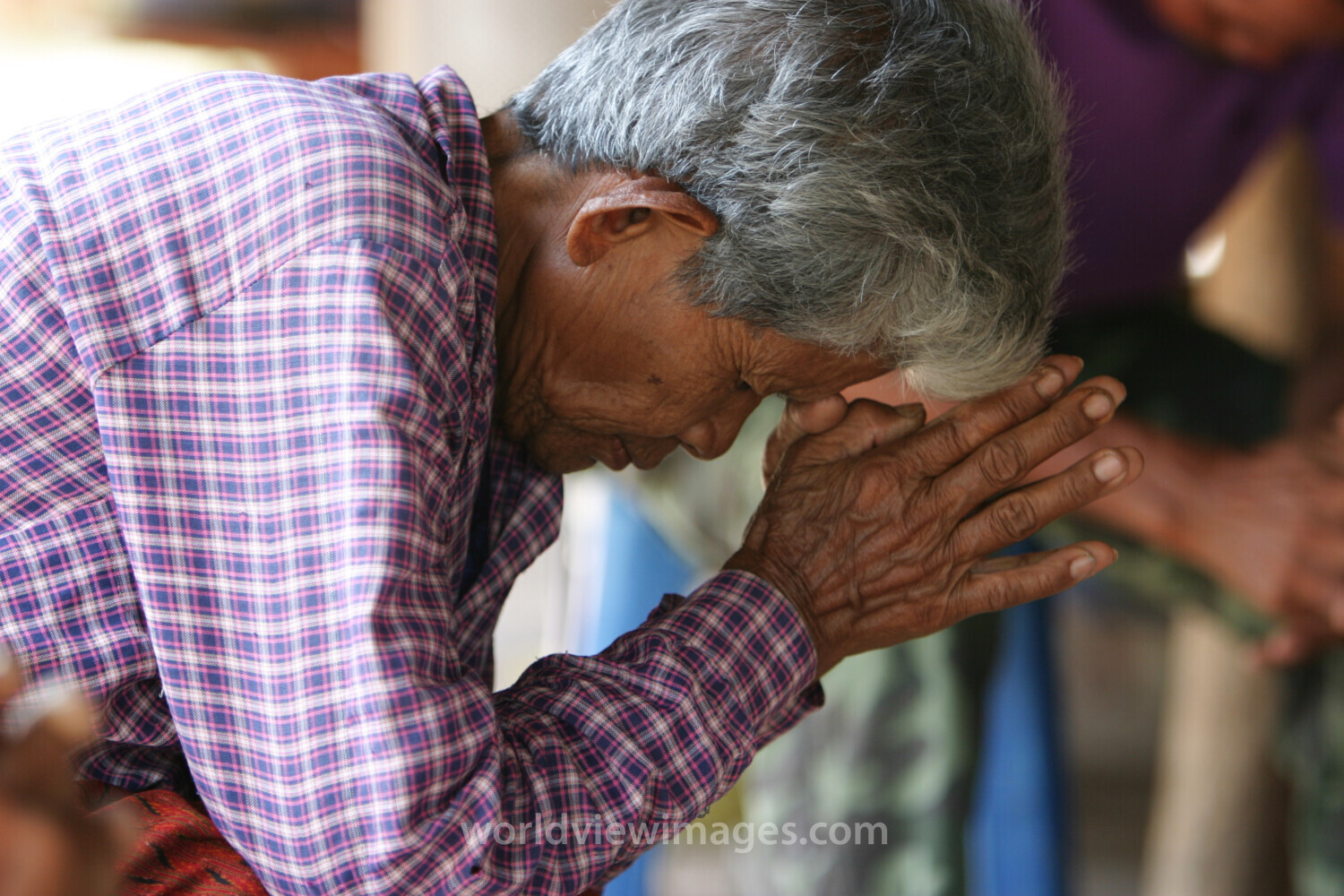 People Praying in Cambodia