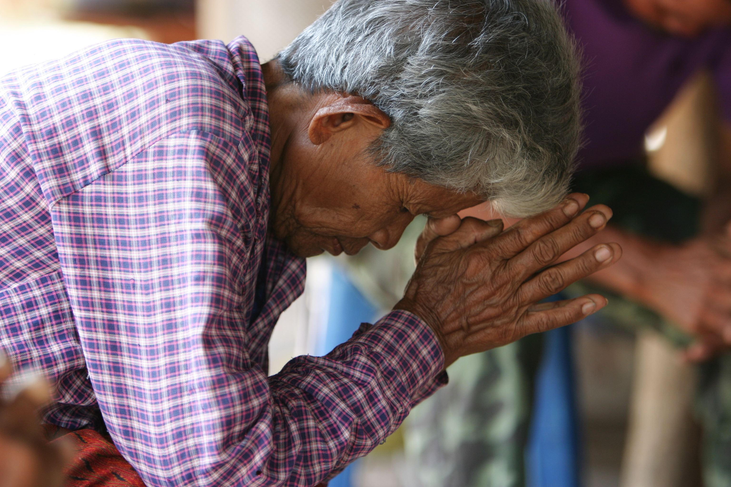 People Praying in Cambodia