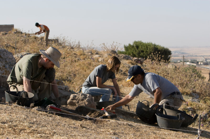 Working on A Dig — Students and Archaeology Enthusiasts enjoy spending six weeks of their summer digging in the dirt, looking for artifacts that may shed lig...