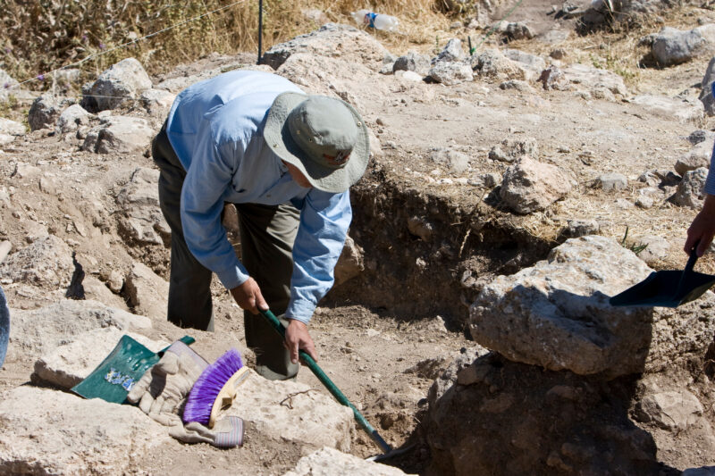 Working on A Dig — Students and Archaeology Enthusiasts enjoy spending six weeks of their summer digging in the dirt, looking for artifacts that may shed lig...