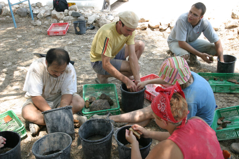 Pottery Washing — After digging up pottery shards all morning, it is time to wash them so that they can be dated according to know pottery styles. — Israel, ...