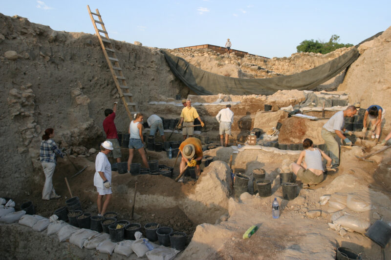 Working on A Dig — Students and Archaeology Enthusiasts enjoy spending six weeks of their summer digging in the dirt, looking for artifacts that may shed lig...