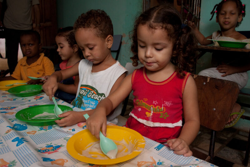 School Feeding — Children from a poor gheto in Brazil attend an ADRA preschool where they get a nutritious meal. — Brazil, South America, Children, Preschool...