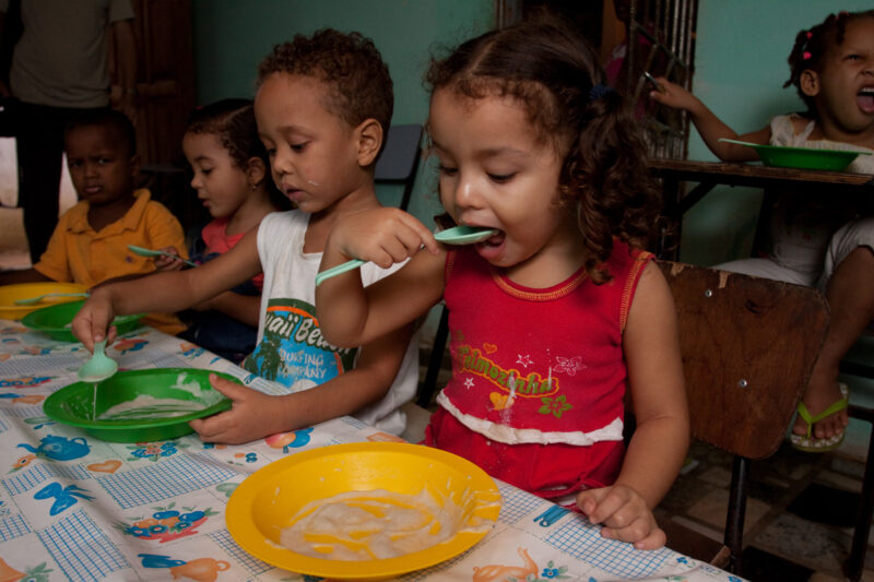 School Feeding — Children from a poor gheto in Brazil attend an ADRA preschool where they get a nutritious meal. — Brazil, South America, Children, Preschool...