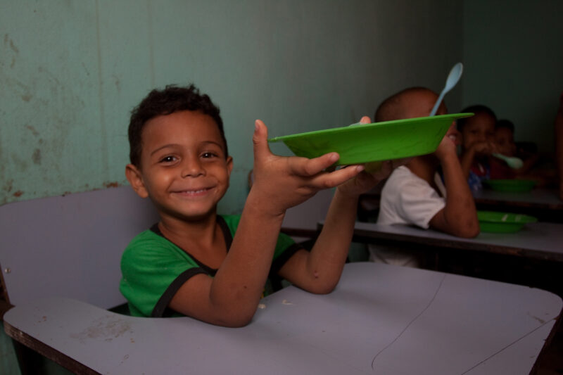 School Feeding — Children from a poor gheto in Brazil attend an ADRA preschool where they get a nutritious meal. — Brazil, South America, Children, Preschool...