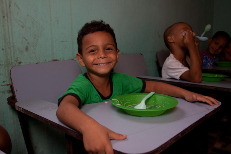 School Feeding — Children from a poor gheto in Brazil attend an ADRA preschool where they get a nutritious meal. — Brazil, South America, Children, Preschool...