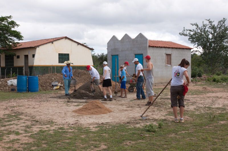 Building a Water Tank — Volunteer Students work together with local villagers in a poor district of a dry region of Brazil to build a water storage tank to c...