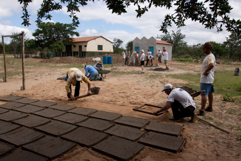 Building a Water Tank — Volunteer Students work together with local villagers in a poor district of a dry region of Brazil to build a water storage tank to c...