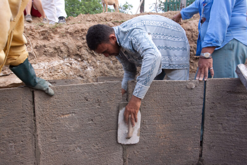 Building a Water Tank — Volunteer Students work together with local villagers in a poor district of a dry region of Brazil to build a water storage tank to c...
