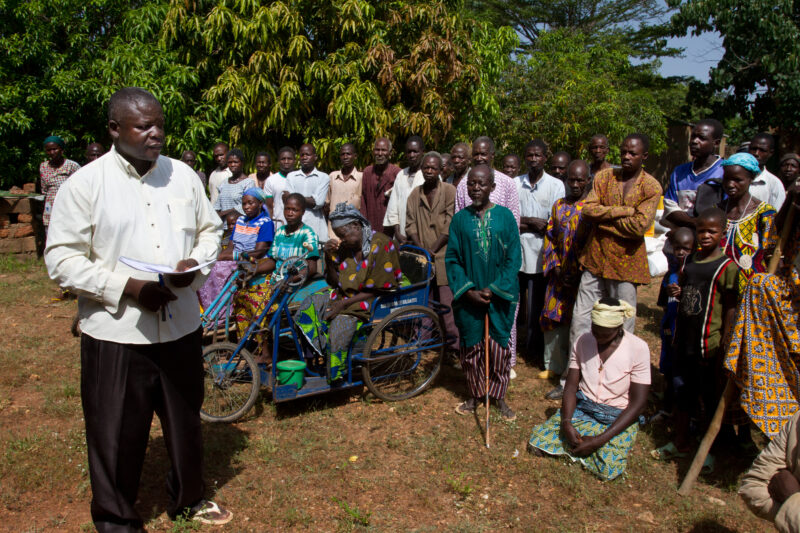 Food Distribution — Villagers in Drought Striken Burkina Faso gather for a short talk before receiving their Food. — Africa, West Africa, Burkina Faso, poor,...