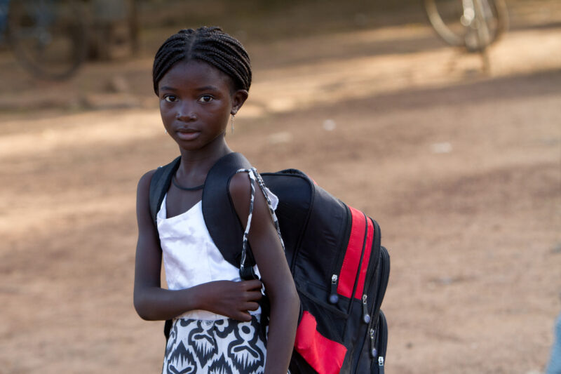 Going to School — Girl on her way to school in Burkina Faso — Africa, West Africa, Burkina Faso, poor, poverty