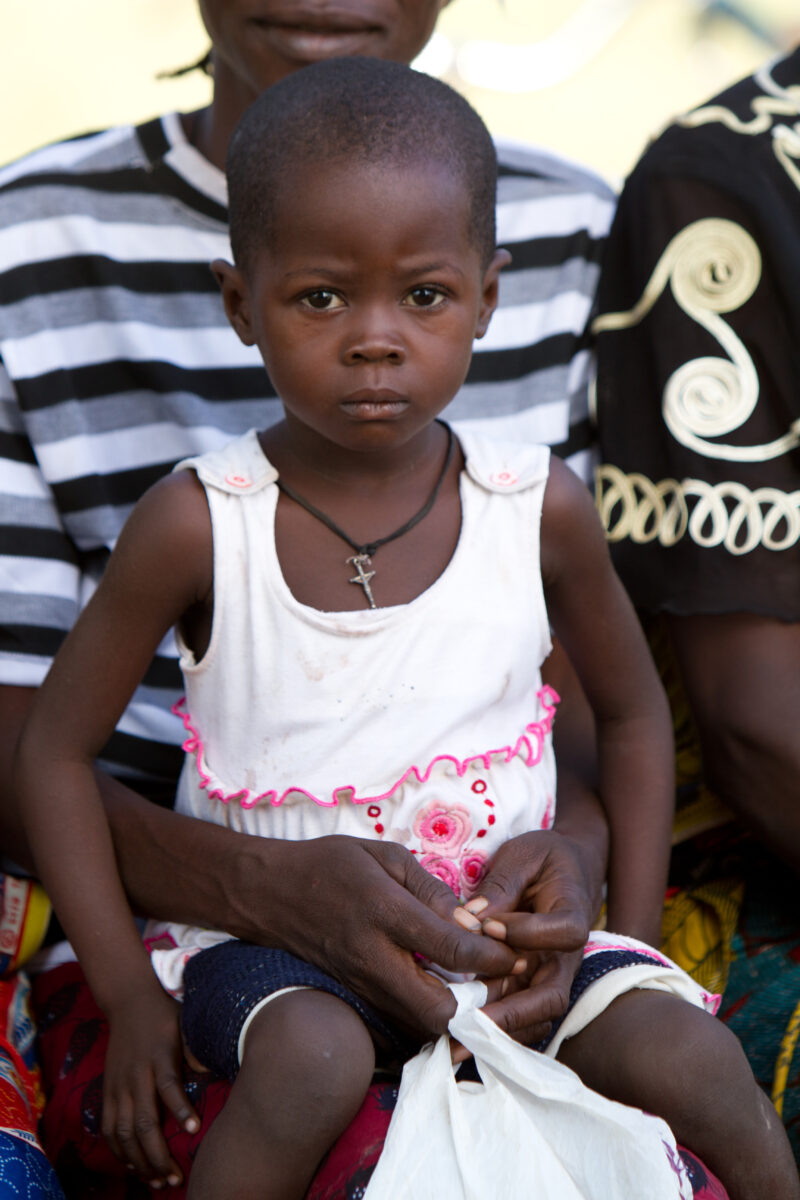 Girl in Burkina Faso — Girl Waits with her mother for a Clinic in Burkina Faso — Africa, West Africa, Burkina Faso, poor, poverty