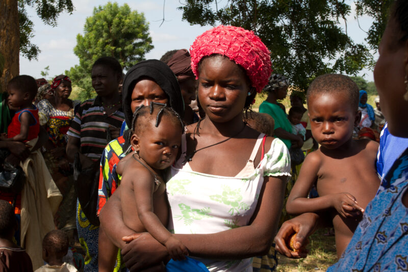 Mother and Baby in Burkina Faso — Mother with her baby, in a remote village in Burkina Faso, Africa. — Africa, West Africa, Burkina Faso, poor, poverty