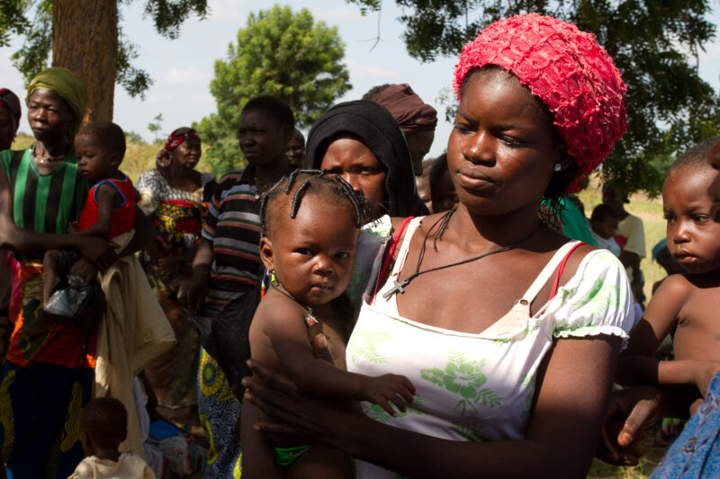 Mother and Baby in Burkina Faso — Mother with her baby, in a remote village in Burkina Faso, Africa. — Africa, West Africa, Burkina Faso, poor, poverty