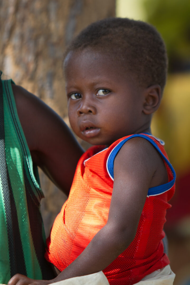 Baby in Burkina Faso — Baby living in rural Burkina Faso facing challenges of illness, hunger and malnutrition — Africa, West Africa, Burkina Faso, poor, pov...