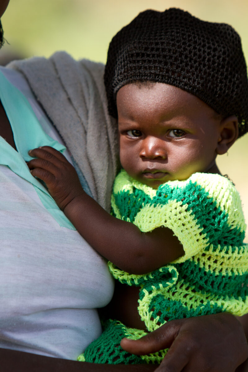 Baby in Burkina Faso — Baby living in rural Burkina Faso facing challenges of illness, hunger and malnutrition — Africa, West Africa, Burkina Faso, poor, pov...