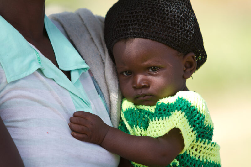 Baby in Burkina Faso — Baby living in rural Burkina Faso facing challenges of illness, hunger and malnutrition — Africa, West Africa, Burkina Faso, poor, pov...