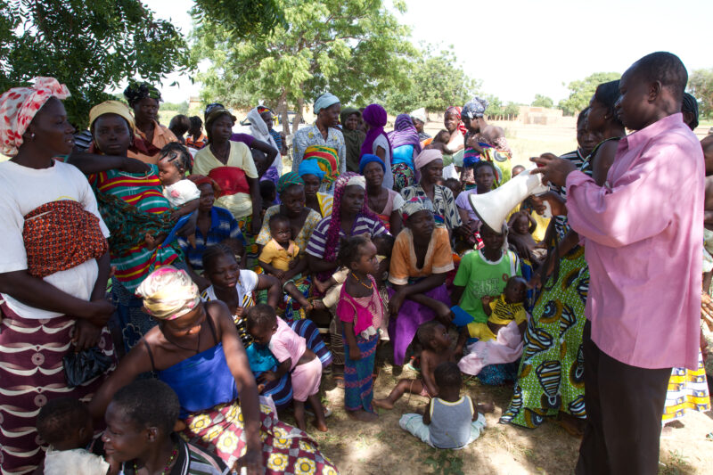 Health Education in Burkina Faso — Health workers share important information on nutrition and health in a remote village of Burkina Faso, Africa. — Africa, ...