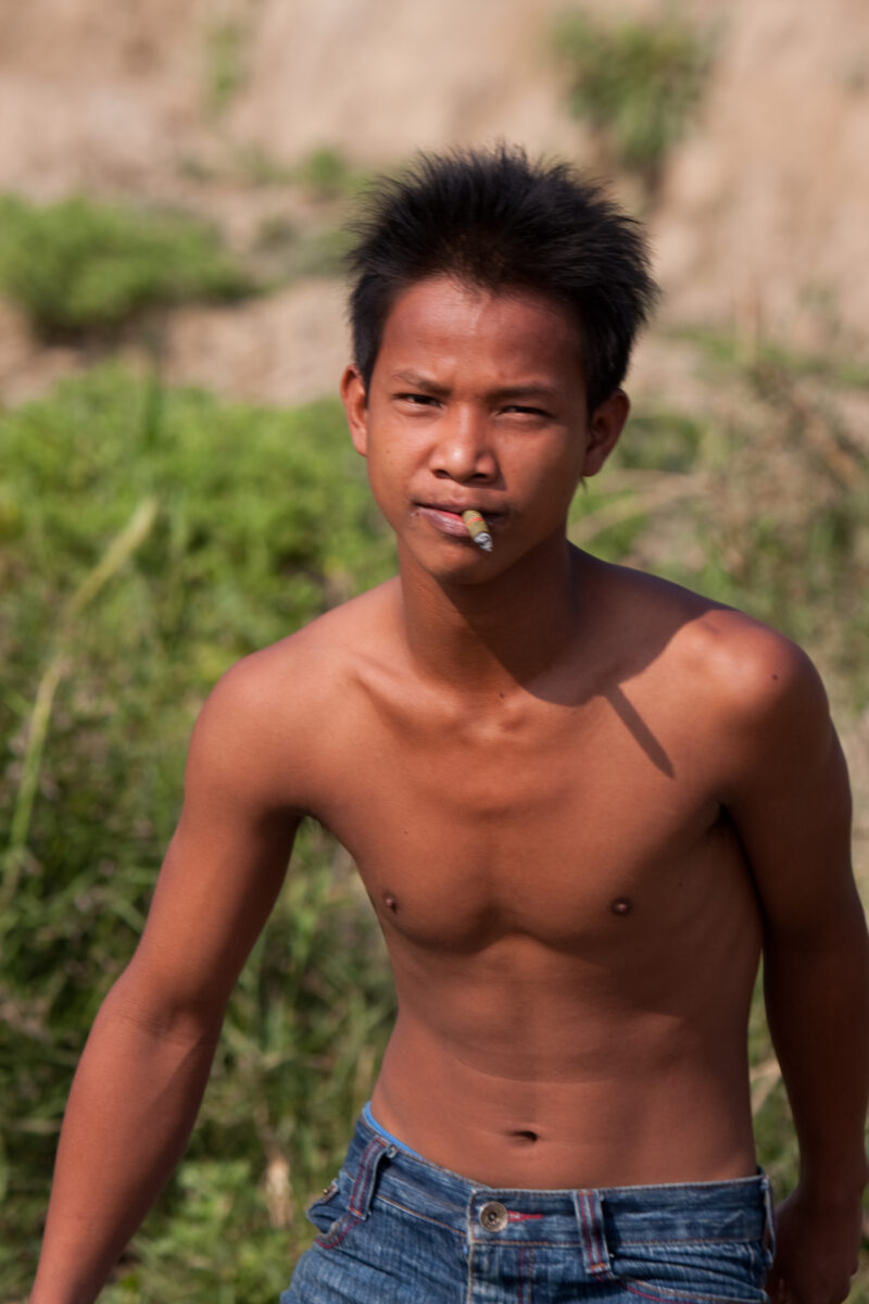 Myanmar — Burmese Man smokes Cigar — Burma, Myanma, boy, boys, faces