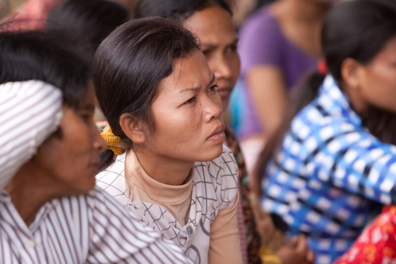 Faces of Cambodia — People living in poverty in rural Cambodia, listen to lecture on Health and Sanitation — Cambodia, woman, faces, women