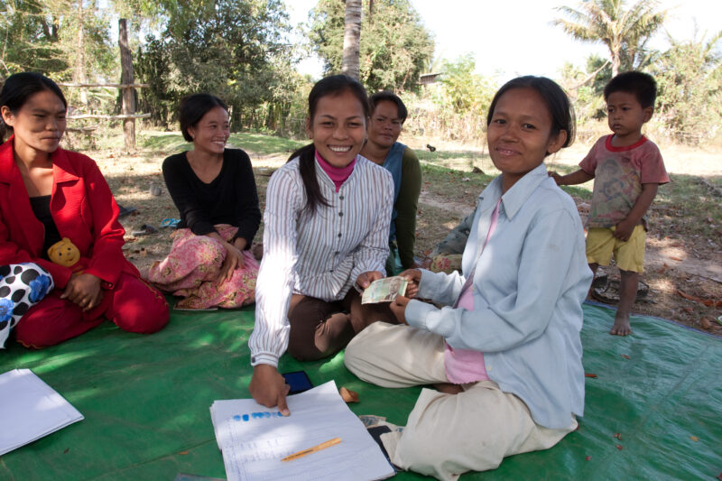 Getting a Small Loan — As part of a Women's group a woman gets a small loan to help her start her own home cottage industry as a way to increase her family i...