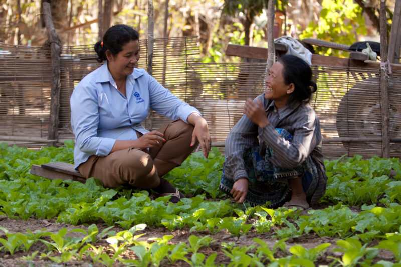 Organic Gardening in Cambodia — Stock Video Footage of Cambodia: Woman learns tips from an ADRA agriculturalist, on how to grow nutritious food in her own or...