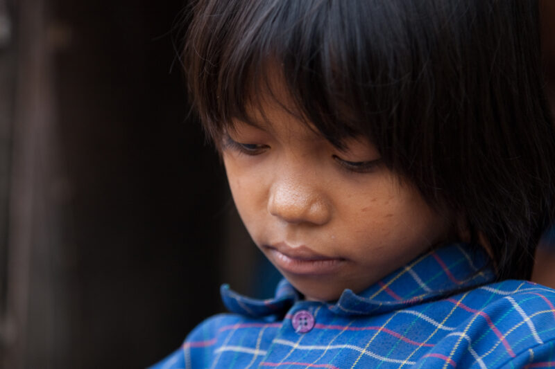 Children of Cambodia — Stock image of young girl living in poverty in a slum of Phnom Penh, Cambodia — Cambodia, ADRA, children, faces, girls