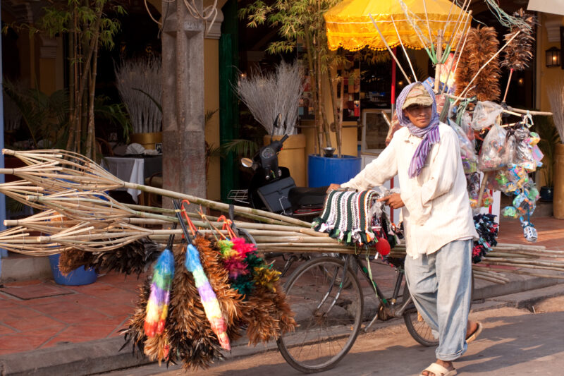 Street Vender in Siem Reap — Stock Image of vender selling a variety of items from his bicycle on the streets of Siem Reap, Cambodia — Cambodia, street, stre...