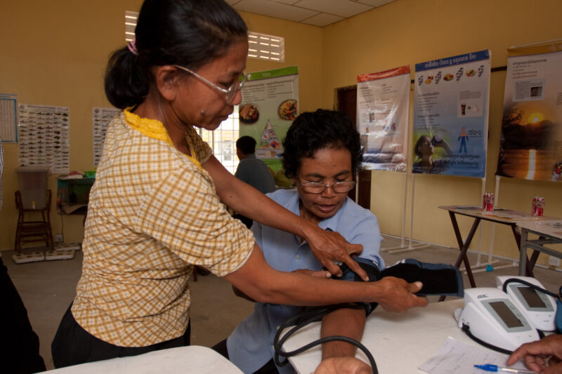 Getting Blood Pressure taken — Stock Image of Blood pressure reading at a health clinic in Cambodia — Cambodia, Health, medical, checkup, doctor visit
