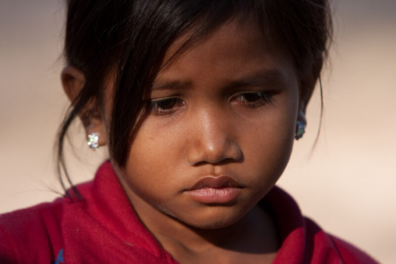Girl in Cambodia — Stock image of young girl growing up in poverty in rural cambodia — Faces, Cambodia, girl, girls, child