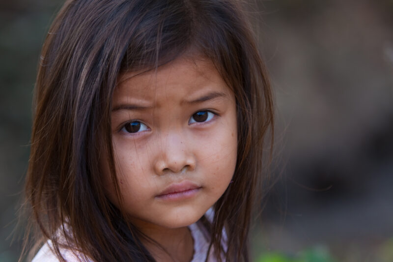 Girl in Cambodia — Stock image of young girl growing up in poverty in rural cambodia — Faces, Cambodia, girl, girls, child