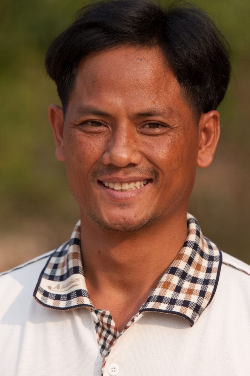 Man in Cambodia — Stock Image of a man smiling in Cambodia in the Evening light — Cambodia, people, faces, men, Khmer