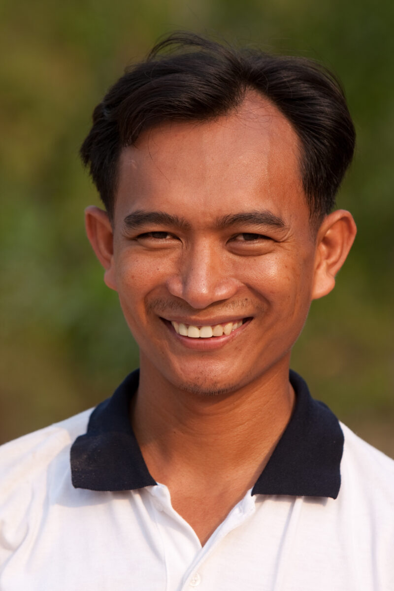 Man in Cambodia — Stock Image of a man smiling in Cambodia in the Evening light — Cambodia, people, faces, men, Khmer