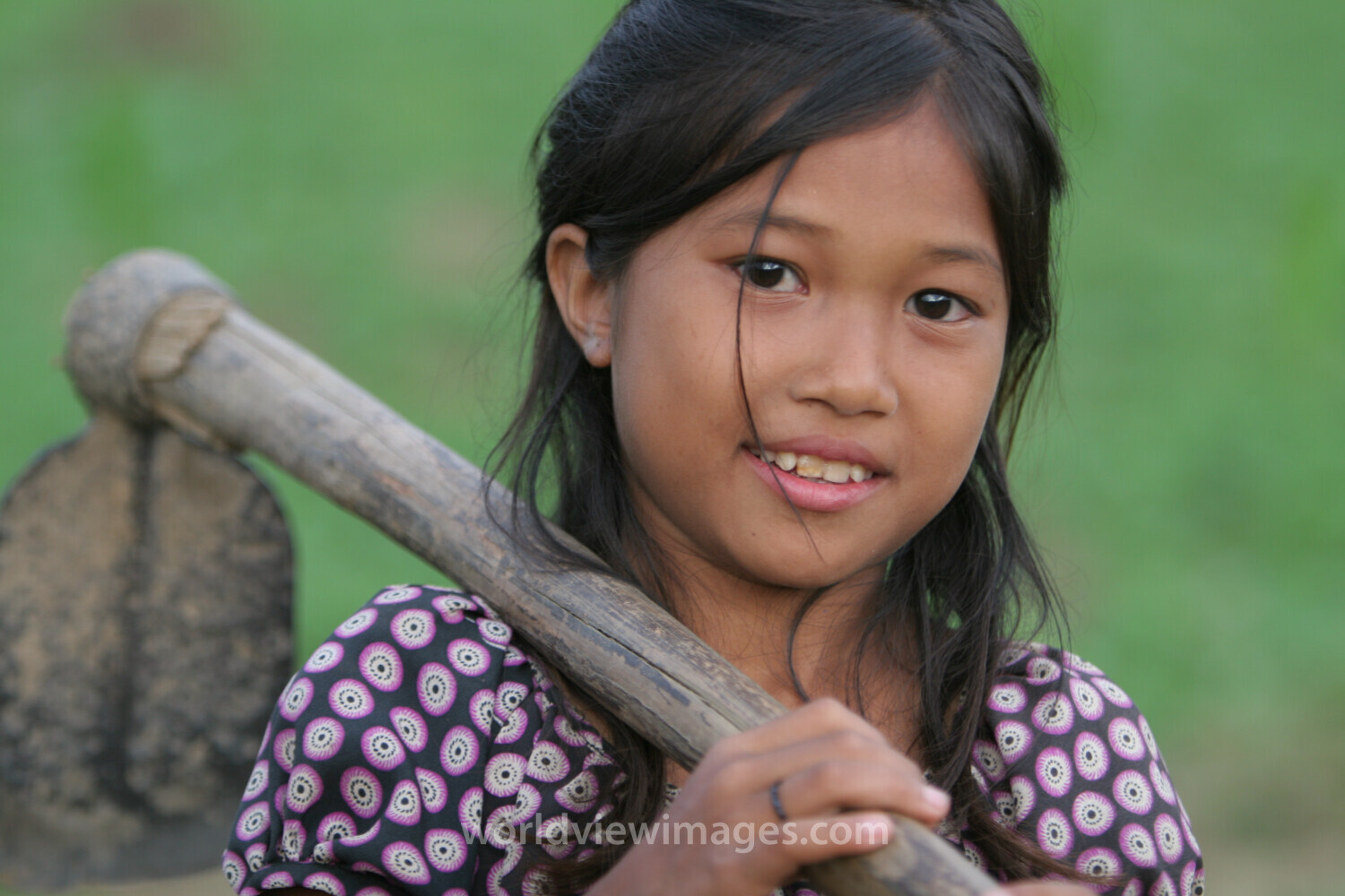 Girl with Hoe in Cambodia